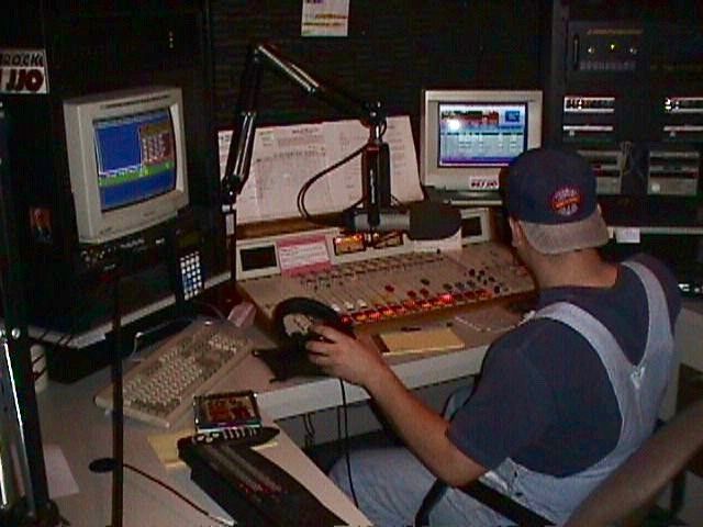 Logan, the host. You can tell this is a midwest radio station, overalls included.